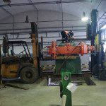 Positioning of Pay Off with two forklifts during upgrading DT in Naxans, Morocco