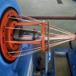 Guiding die for central layer with parallel wires