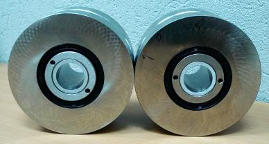 The complete assembled pair of rollers for round form
